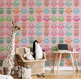 Stylish kids room accent wall wallpaper featuring pink pastel cute owl pattern design, perfect for modern nursery interior decor