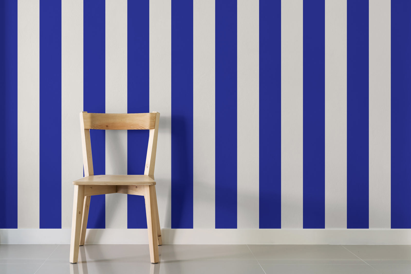 Bold blue stripe pattern enhancing dining room wall with clean lines