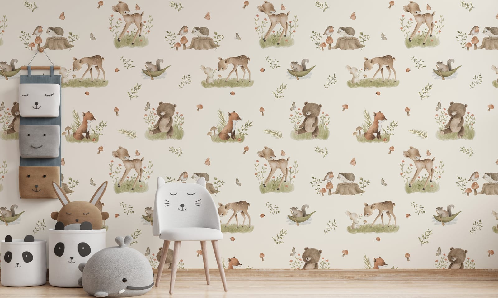 Woodland animal wallpaper mural installed on nursery accent wall creating warm nature themed interior with soft neutral forest illustration style.