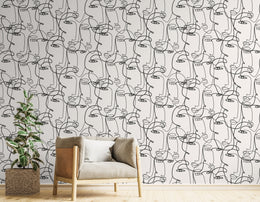 Welcoming hallway interior decorated through expressive portrait line sketch pattern producing gallery atmosphere