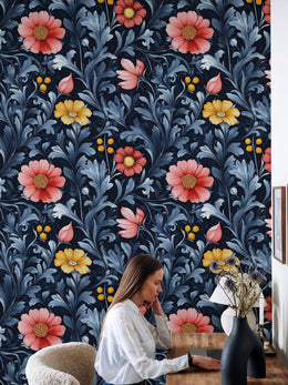 Home office floral wallpaper with deep navy leaves and bold coral flower accents