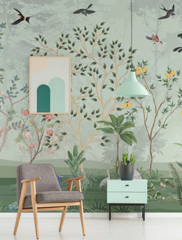 Tropical garden wallpaper with flying birds and lemon branches creating calm interior atmosphere