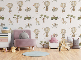 Cute kids room accent wall wallpaper featuring giraffe, monkey, balloons in soft hues