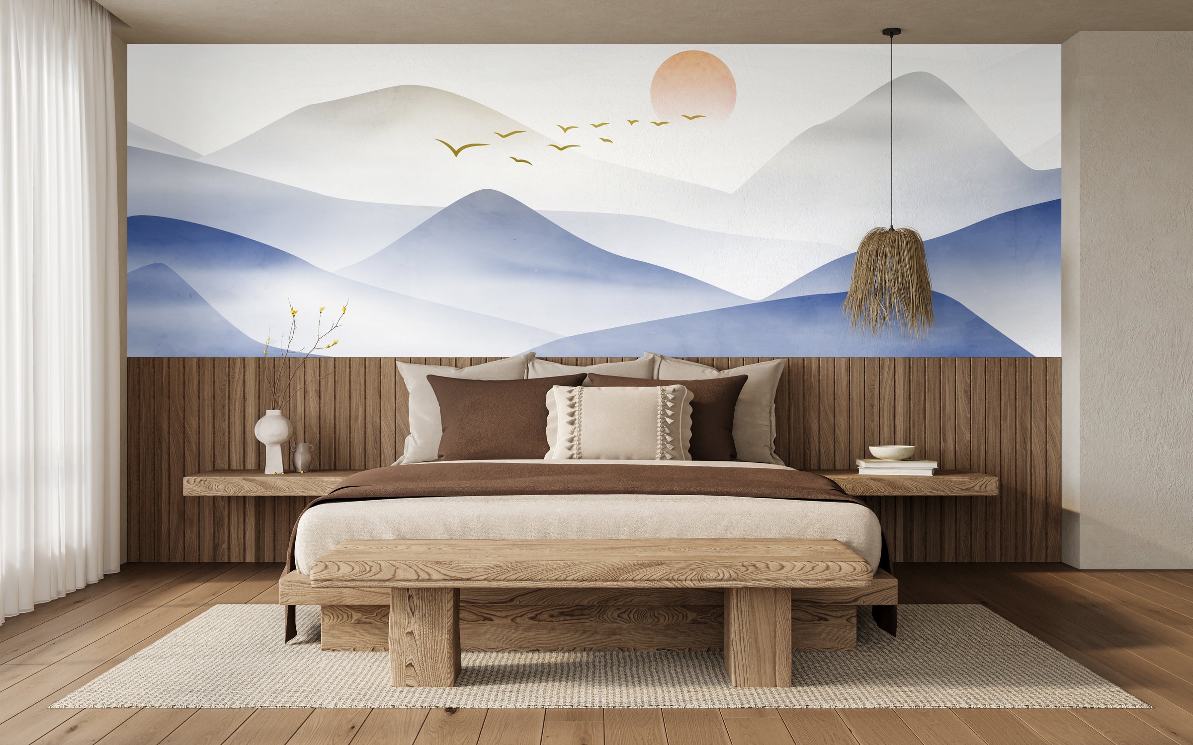 Striking blue mountain mural with golden birds, creating a powerful guest room wall impact.