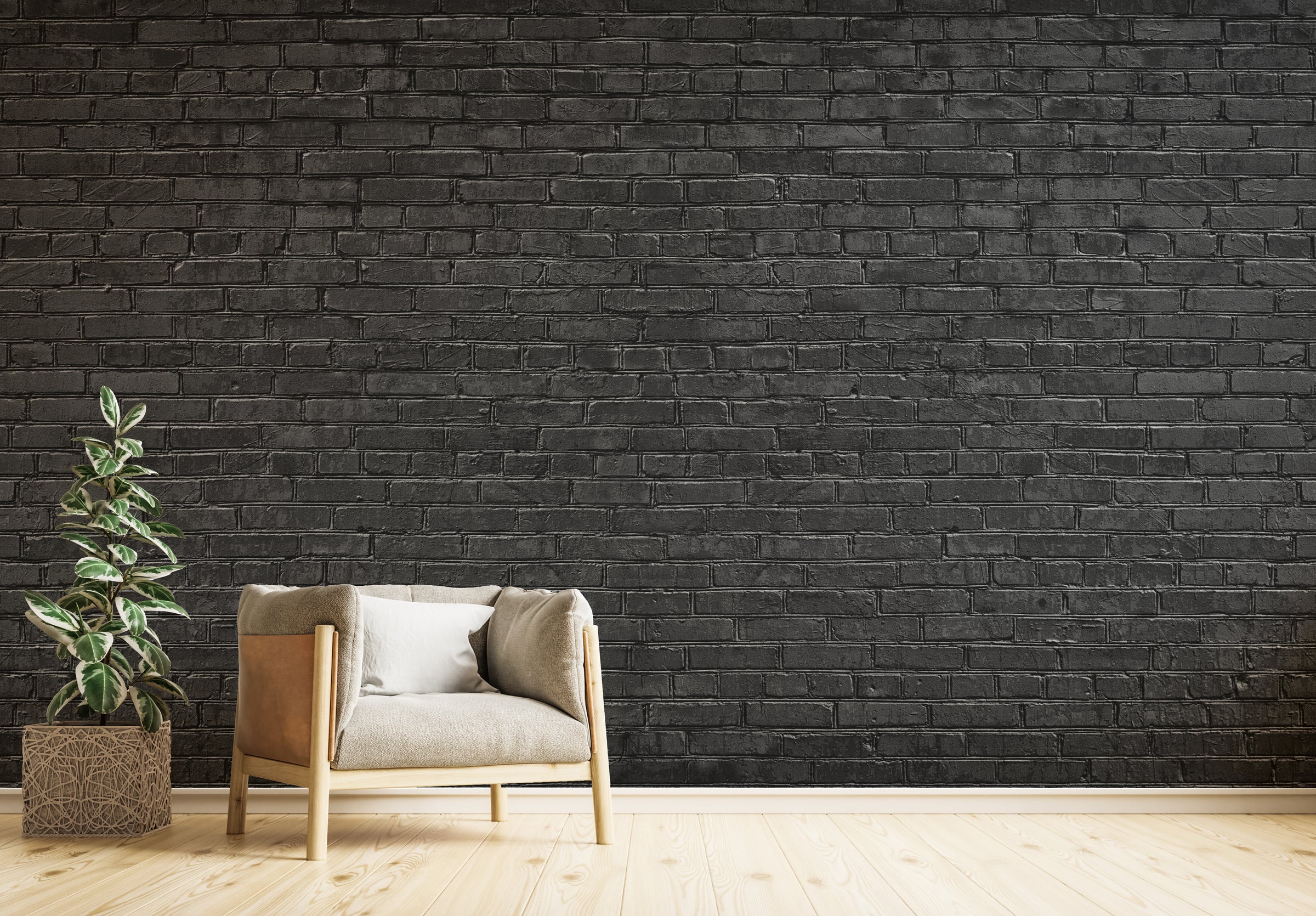 Black statement brick wall mural elevating a trendy kitchen interior with dramatic contrast