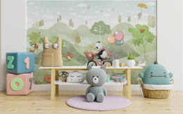 Playroom wallpaper with cartoon panda bicycle, rabbits, and dreamy woodland background