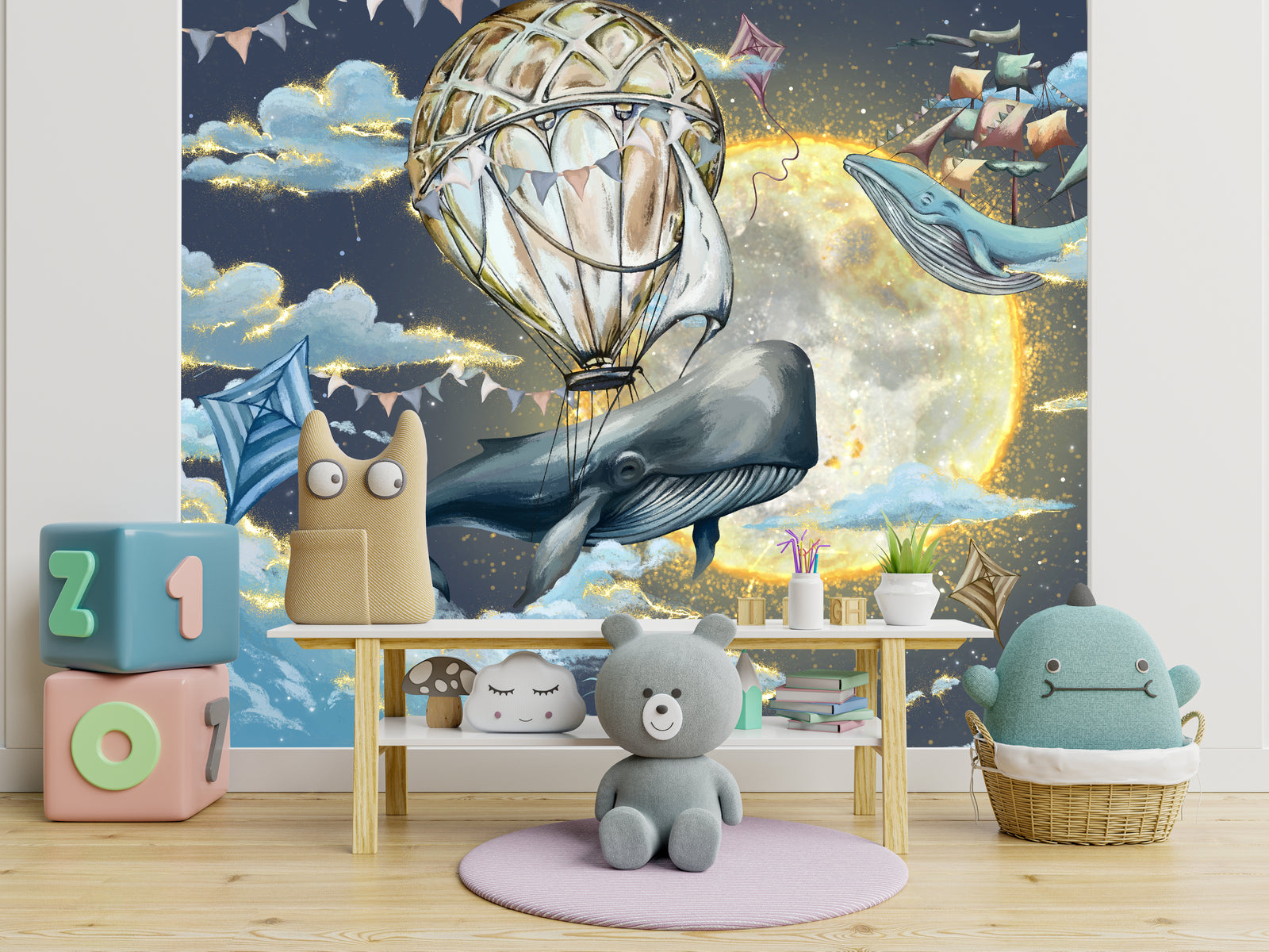 Stylish toddler playroom accent wall displaying fantasy ocean illustration with whale balloon stars and night sky scenery.
