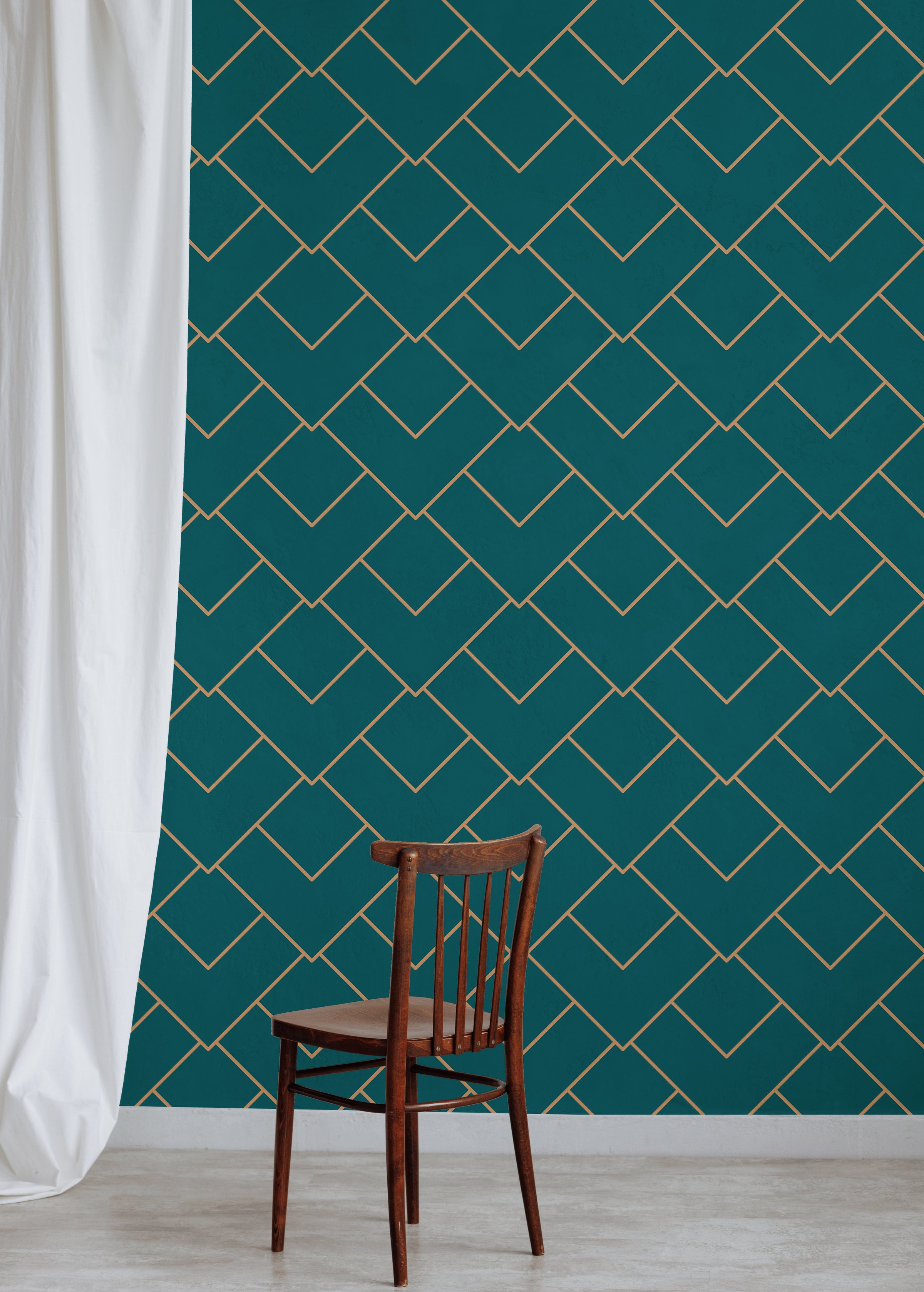 Luxury lounge area featuring teal geometric wallpaper with refined gold detailing
