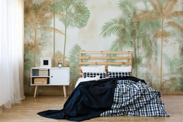 Tropical leaf pattern in light green tones creating calm bedroom accent wall