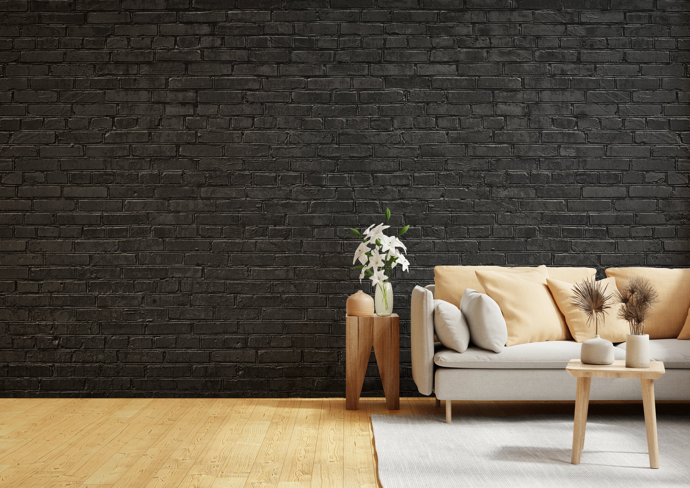 Matte black brick wallpaper mural enhancing a contemporary livingarea with a strong architectural statement
