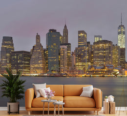 Minimal contemporary interior with dramatic waterfront skyline mural highlighting evening metropolitan architecture.