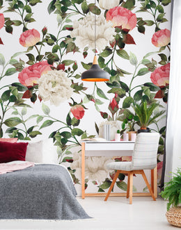 Vintage pink peony botanical wallpaper creates eye catching statement wall in apartment living area